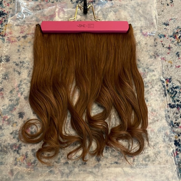 Halo hair extension-red hair. With hanger and storage bag, extra cord, and comb. - Picture 1 of 10